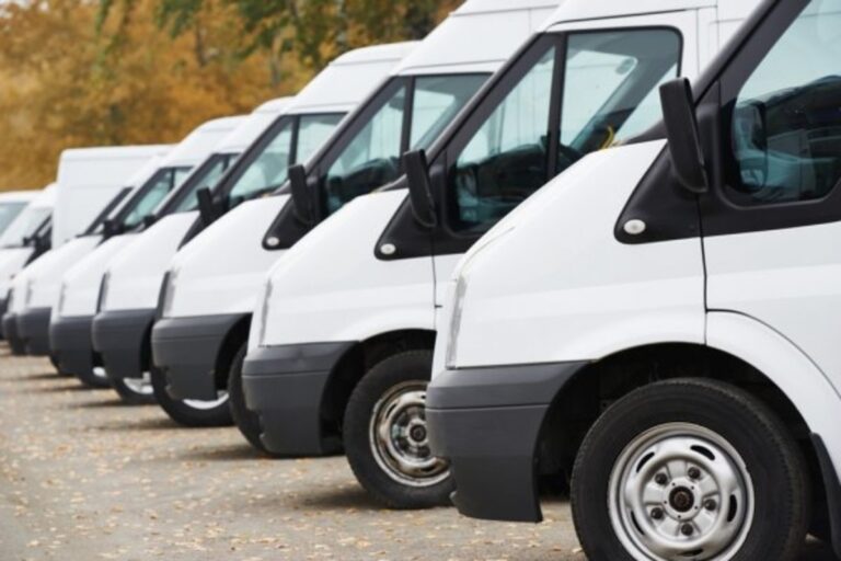 New fleet of MK&S Logistics white vans lined up