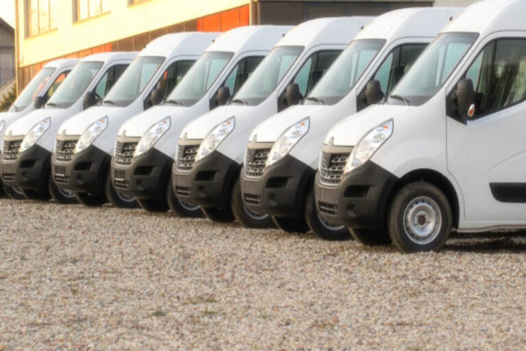 New fleet of MK&S Logistics white vans lined up